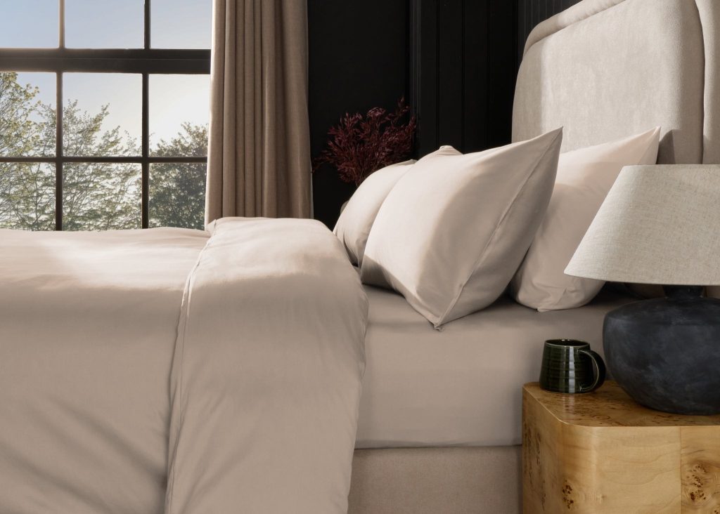 Simba Egyptian Cotton Bedding Set on a made bed in a bedroom