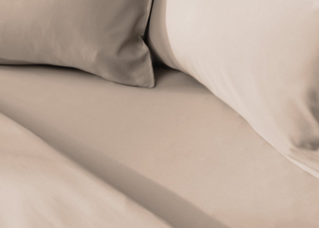 Simba Egyptian Cotton Fitted Sheet on a made bed, close view of the fabric