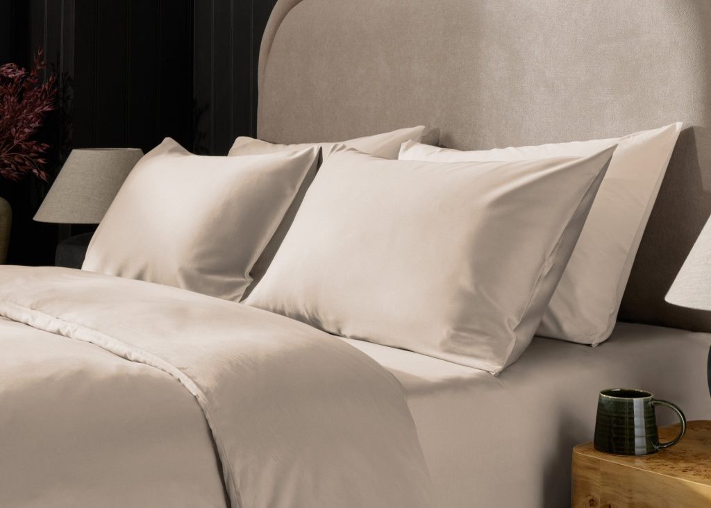 Simba Egyptian Cotton Pillowcase Pair on a made bed in a bedroom