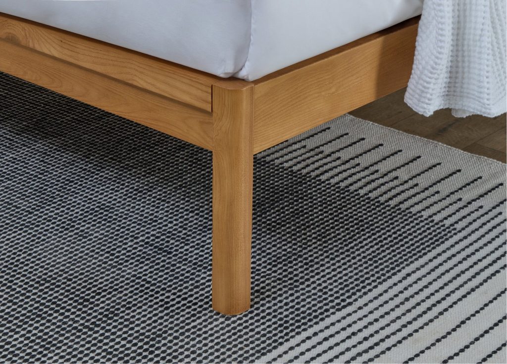 Simba Sherwood Solid Ash Bed, close-up of the ash leg and side rail