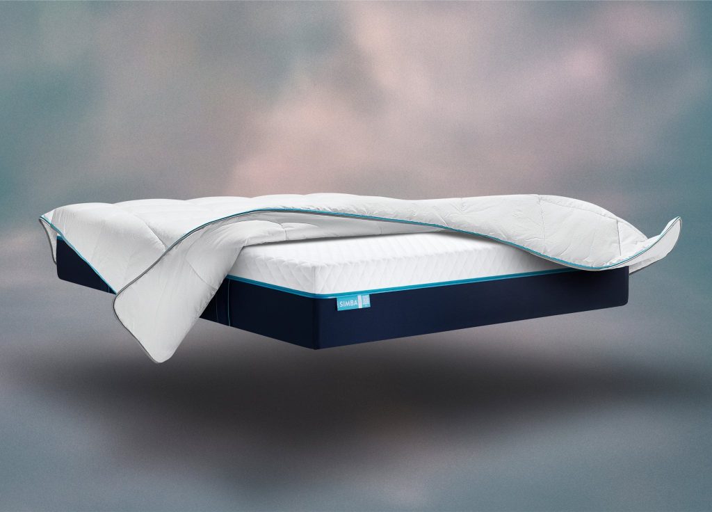 Simba Summer Hybrid Duvet draped over a Simba mattress