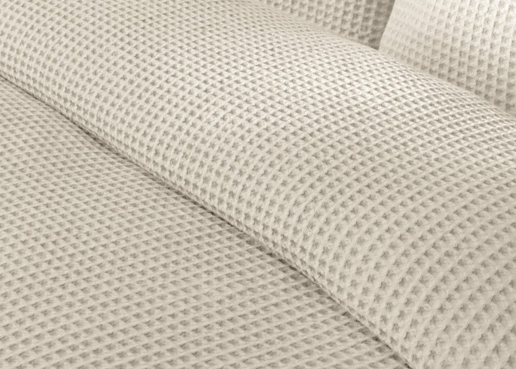 Simba Waffle Cotton Duvet Cover on a made bed, close view of the fabric