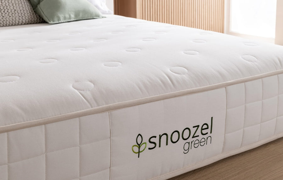 Snoozel Green Organic Mattress, close-up of the tufted organic cotton top and quilted border