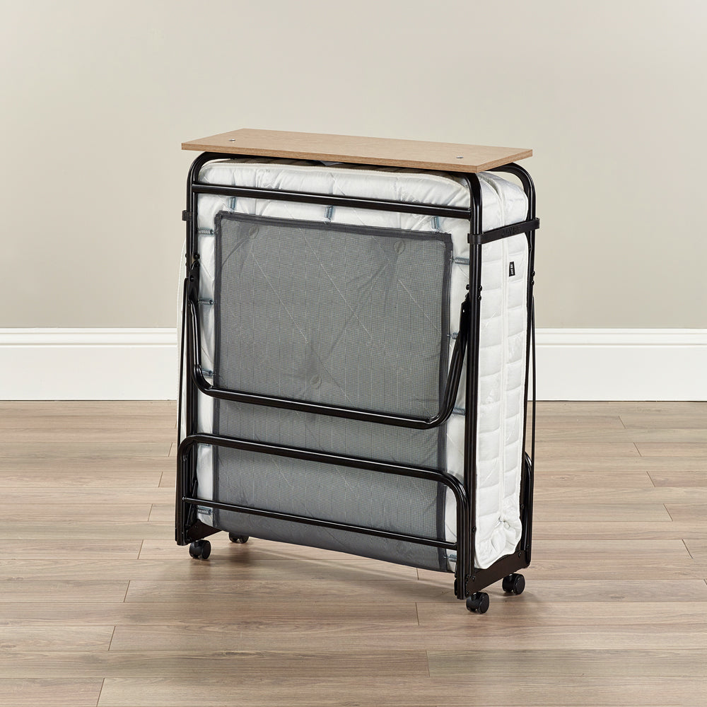 Jay-Be Supreme Folding Bed folded upright with its pocket sprung mattress