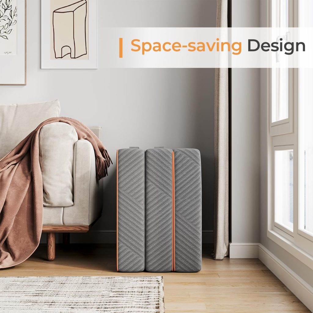 Vesgantti folding mattress folded upright beside a sofa
